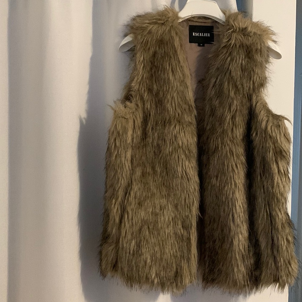 Faux fur vest by Escalier Has a hook for closure if needed.